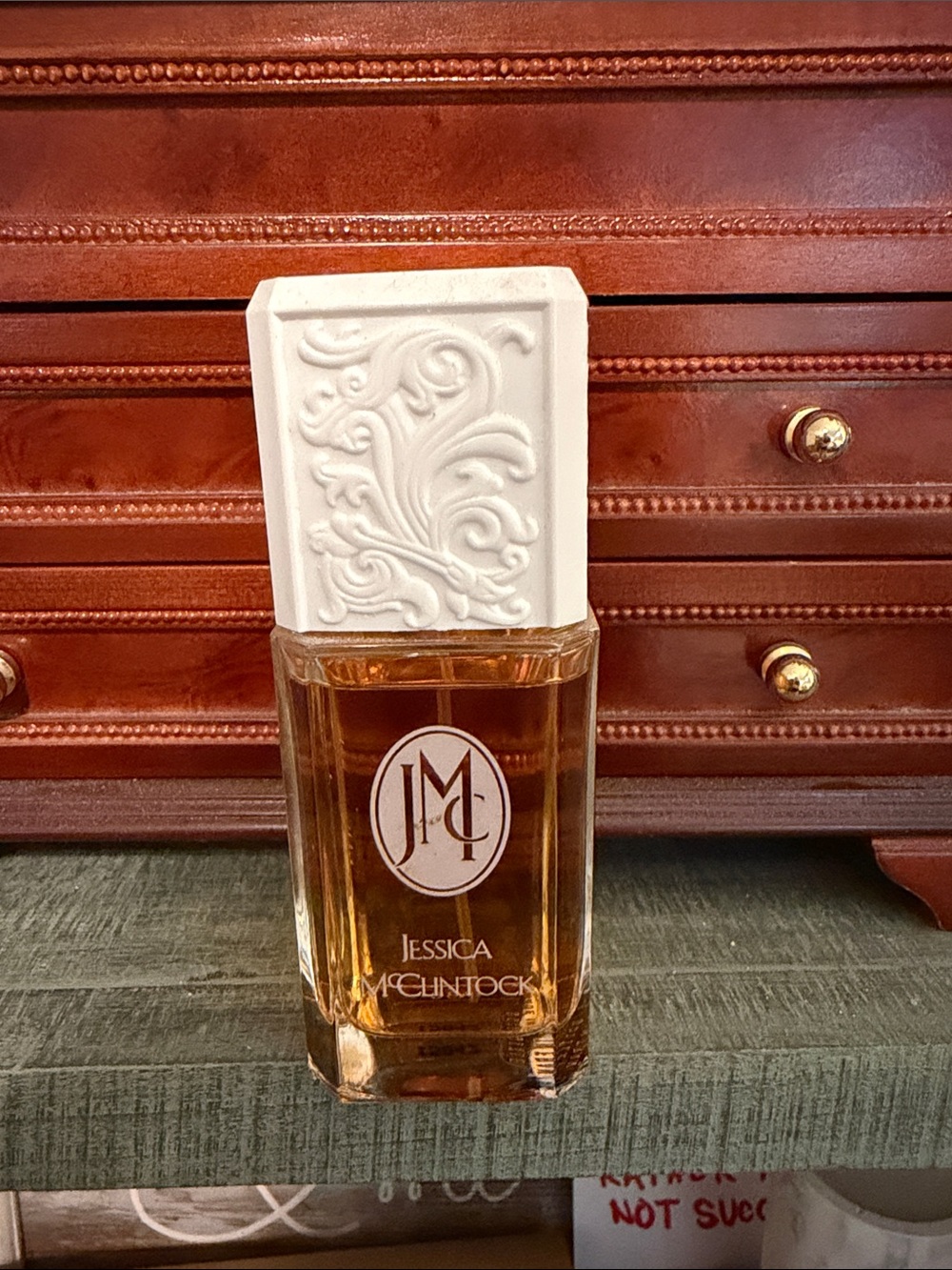 Jessica McClintock Amber Glass Decorative Bottle with White Embossed Stopper